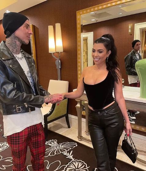 Kourtney Kardashian snaps with Travis Braker at the UFC event